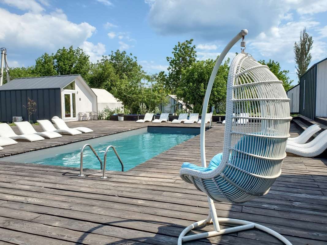 Relaxing sunny summer day by the pool