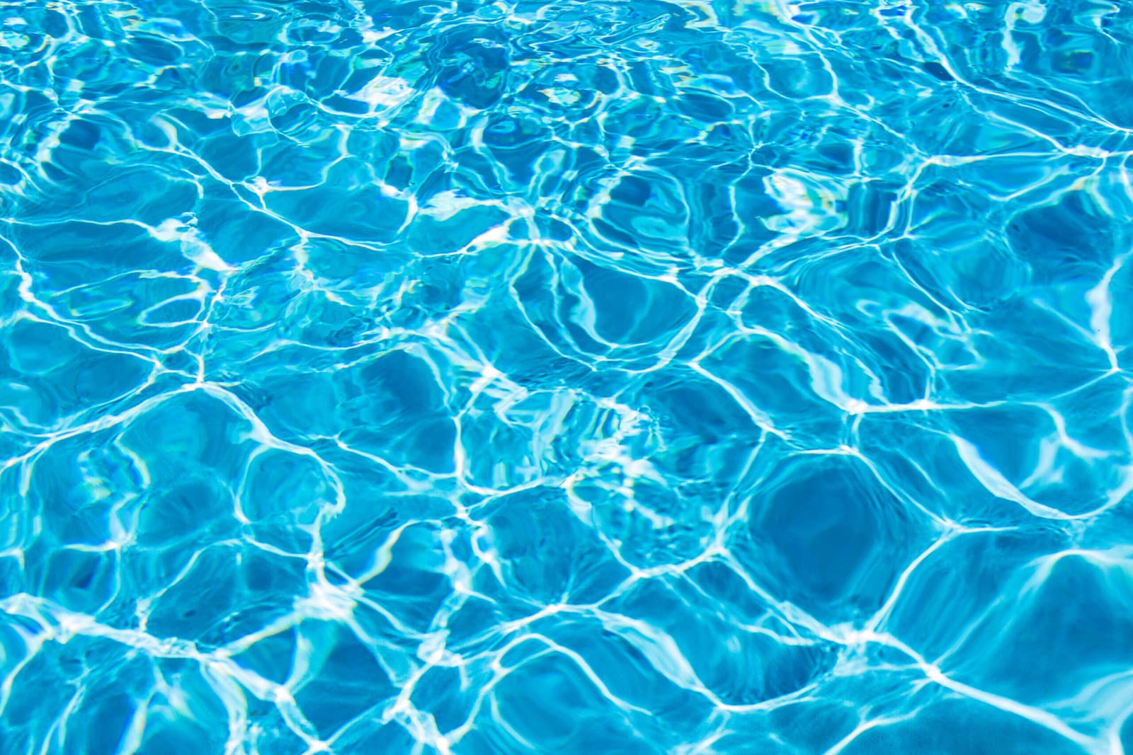 Clear blue swimming pool water for a pool service billing article