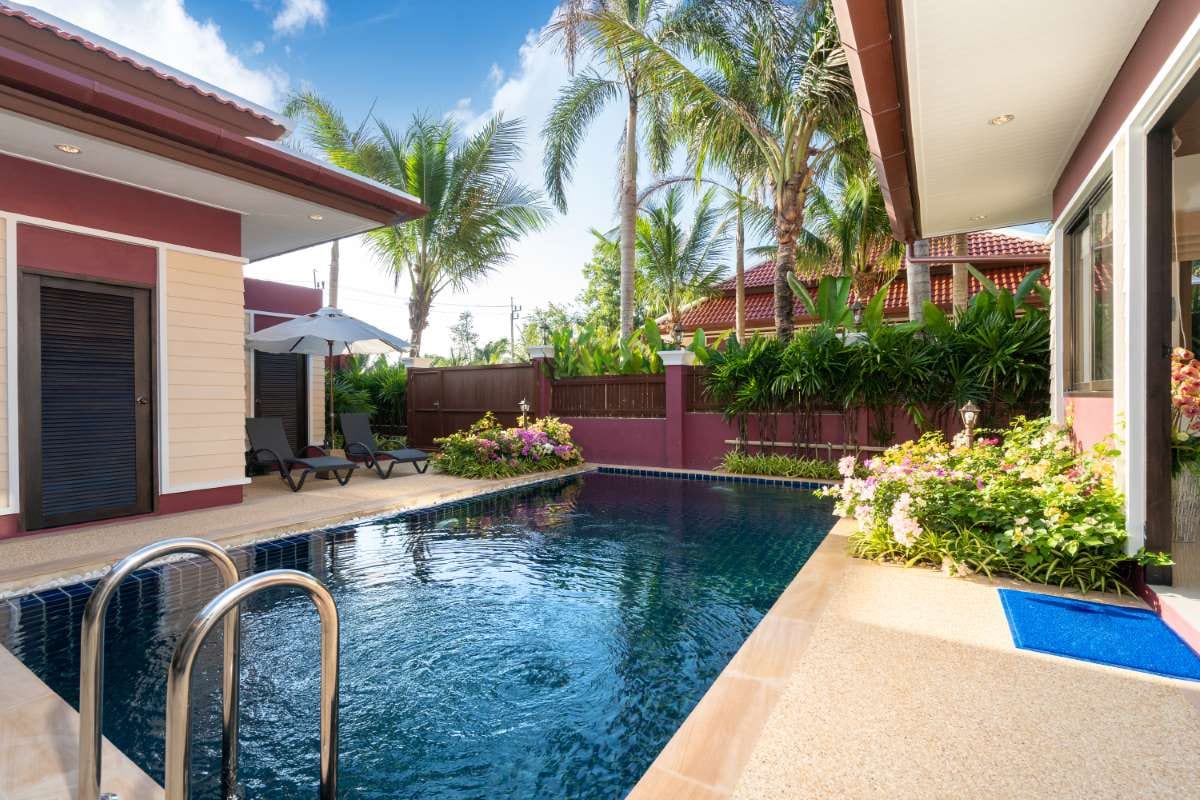 Luxury villa exterior with a custom-designed pool courtyard