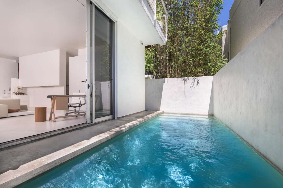 Poolside seating with table and chairs for a budget-conscious pool business