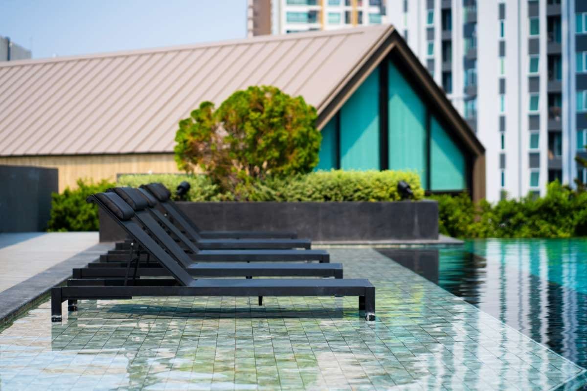 Modern condominium recreation area with swimming pool