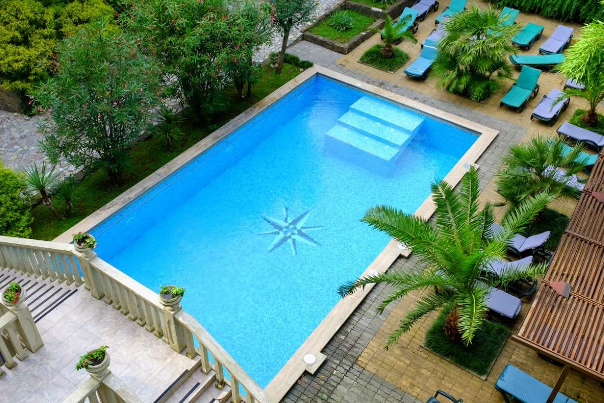 Blue swimming pool water surface for pool service invoicing context